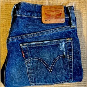 Levi’s 501 button fly skinny straight jeans. Slightly distressed. W 27., L 28